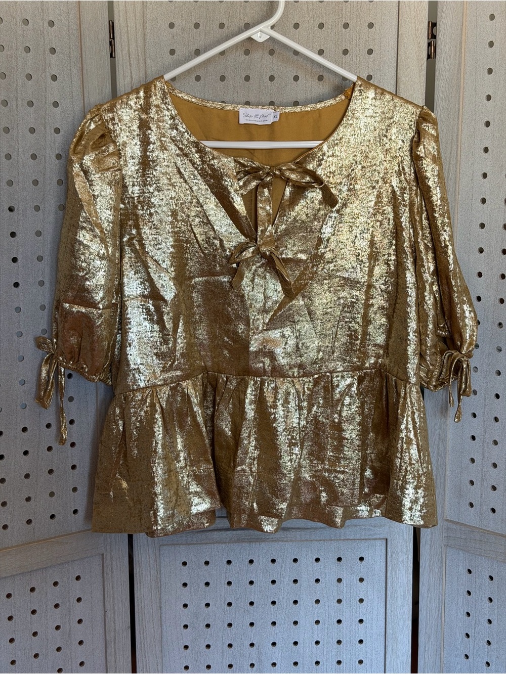 Shimmering Gold Tie-Front Peplum Blouse